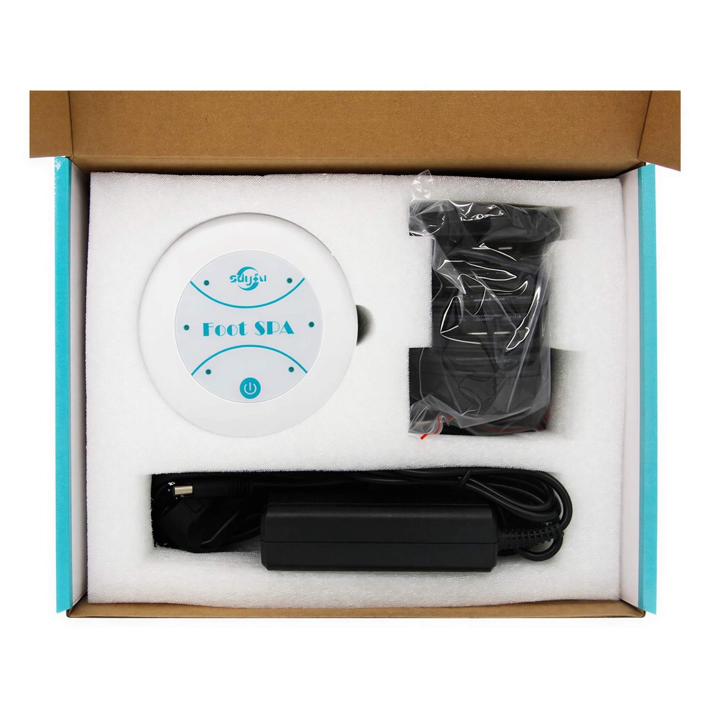 Mini foot massager in a cardboard box, includes a round white device labeled "Foot Spa," power adapter, and cables.